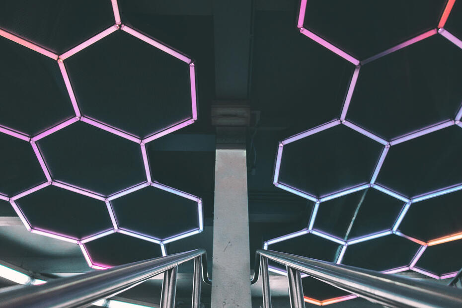 gray metal hand railings with hexagon ceiling